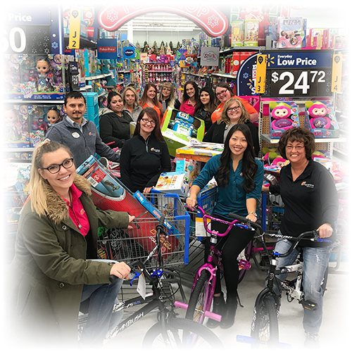 Ascentra staff shopping for Toys for Tots