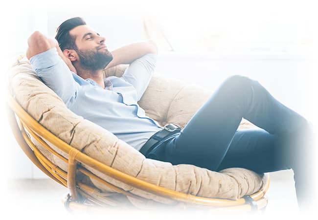 Man relaxing in a comfy chair